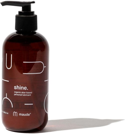 En brun flaska med pump, märkt 'shine' med naturlig aloe-baserad personlig glidmedel, från Maude.