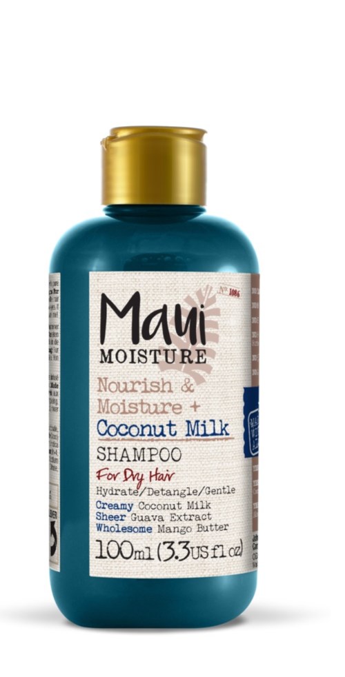 Blauwe shampoo fles met een gouden dop, gelabeld voor voedende kokosmelk voor droog haar.