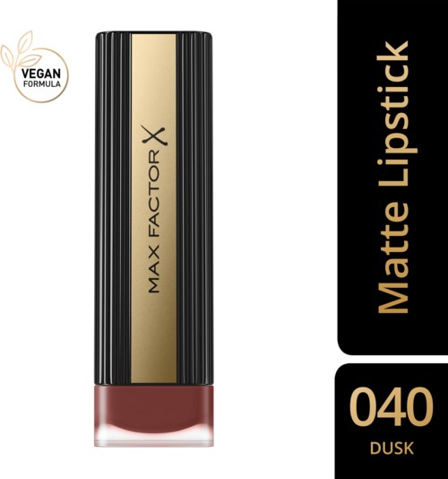 En läppstiftsflaska med svart och guld design, märkt 'Max Factor X Matte Lipstick Dusk,' och ett veganskt formelbärare.