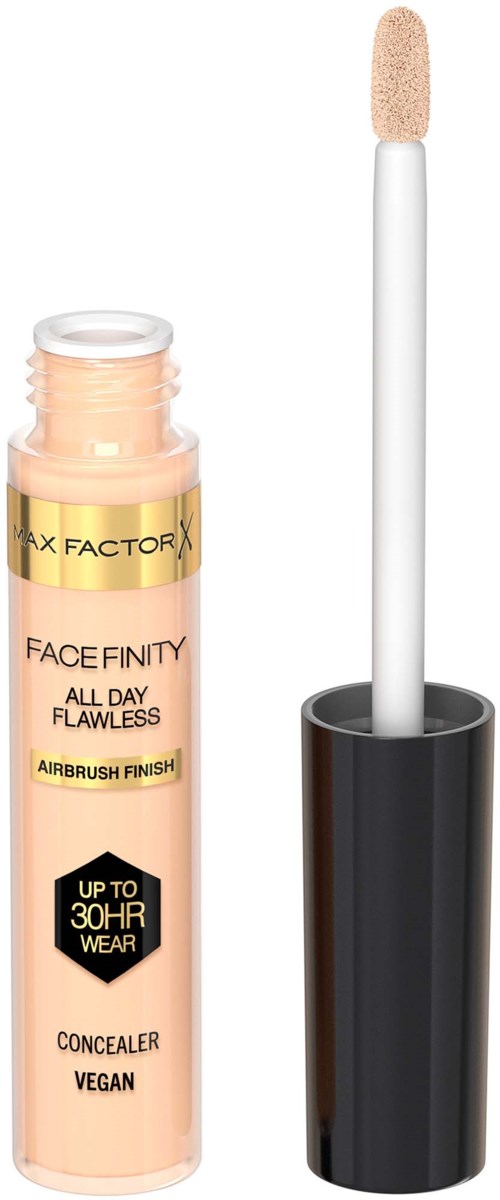 Lip gloss tube with a wand applicator and black cap, containing light peach-colored gloss.