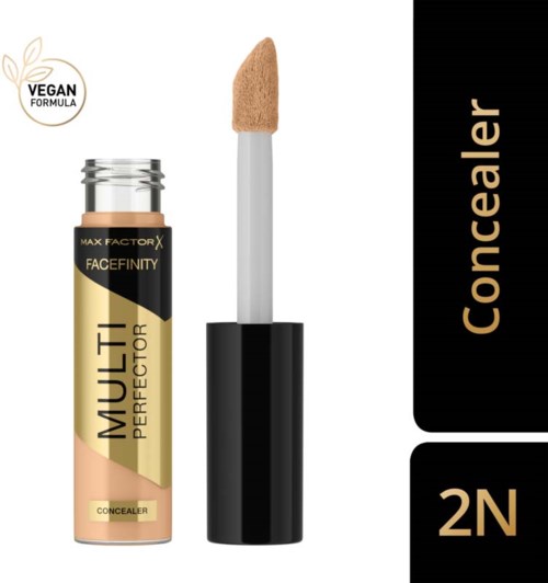 En concealer-stav med en svampapplikator, märkt som "Multi Perfecter 2N," med veganskt formulering skrivet på en badge.