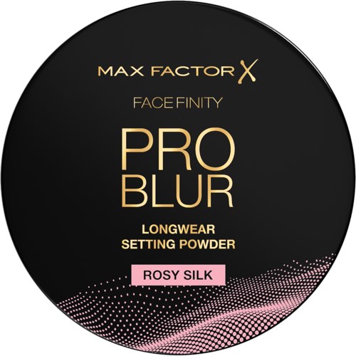 Musta pyöreä rasia, jossa on kulta- ja vaaleanpunainen teksti, kuvaa kasvopuuteriä nimeltä Pro Blur sävyssä Rosy Silk.