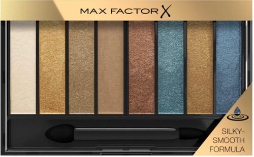 A palette of 8 colorful eyeshadows ranging from gold to blue with a small applicator. Max Factor brand.