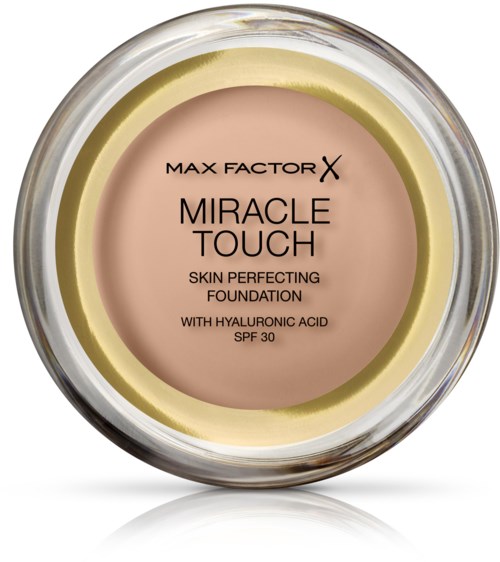 Ronde foundation container met beige product, gele ring en zwarte tekst. Gelabeld Max Factor X Miracle Touch.