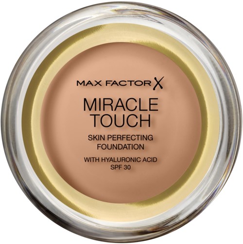 Een ronde foundation-container met het label 'Max Factor Miracle Touch' met hyaluronzuur en SPF 30. Licht beige.