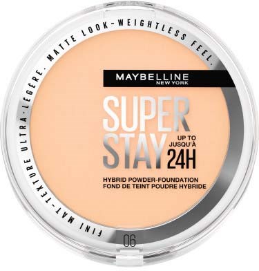 Ein runder Maybelline Make-up mit beigem Ton, schwarzem und weißem Text und durchsichtigem Deckel.