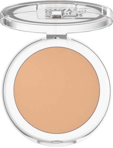 En kompakt med beige pressad puder och ett genomskinligt lock som öppnas uppåt.