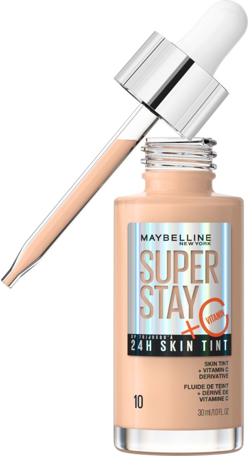 Ein Nagellackflasche mit Tropfer gefüllt mit hellbeiger Flüssigkeit.