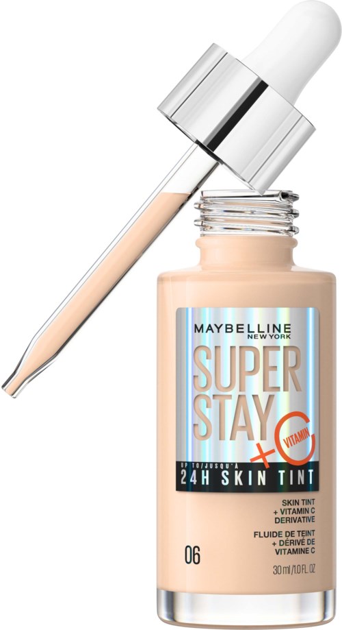 En beige hudfärgflaska med en dropplock, etiketten visar att den ger 24 timmars hudhydration och C-vitamin.