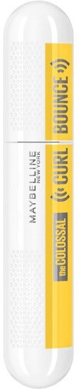 En vit tub med gula etiketter och svart text om en mascara för lock och volym.