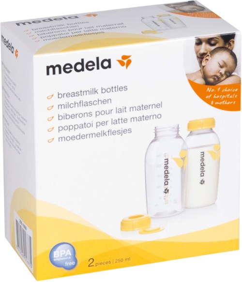 Eine Schachtel mit zwei Brustmilkflaschen mit gelben Deckeln, Marke Medela, BPA-frei, je 250 ml.