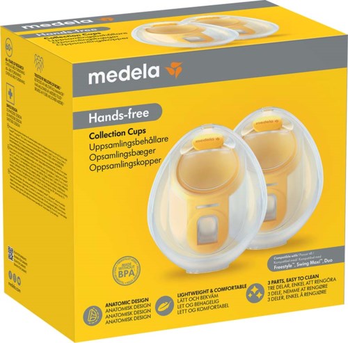 Yellow box with two clear, yellow-handled collection cups for breastfeeding, labeled 'Medela' and 'Hands-free' in multiple languages.