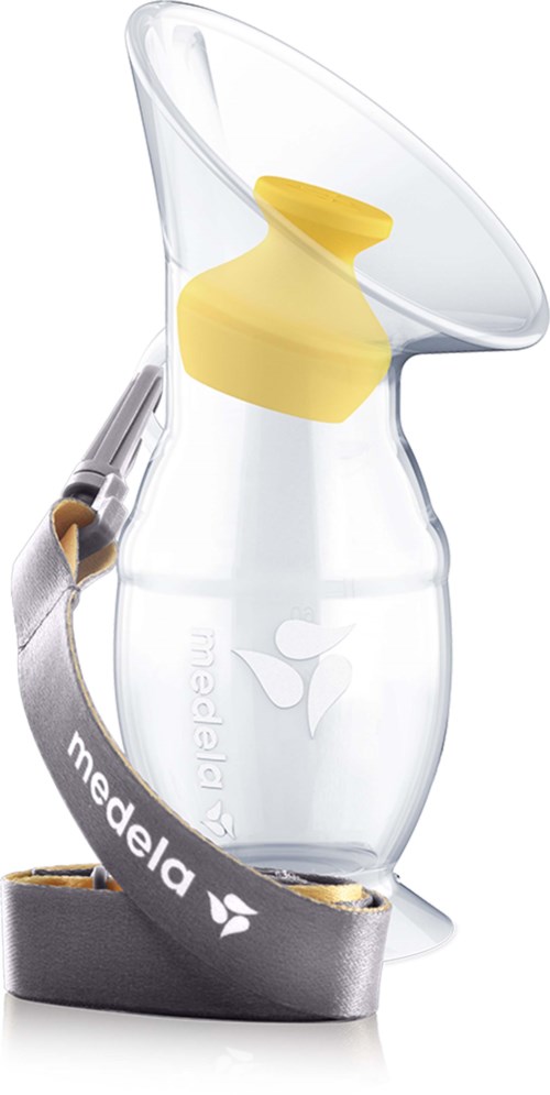 A clear plastic mask with yellow filter inside, connected to a gray strap labeled "Medela," used for breastfeeding.