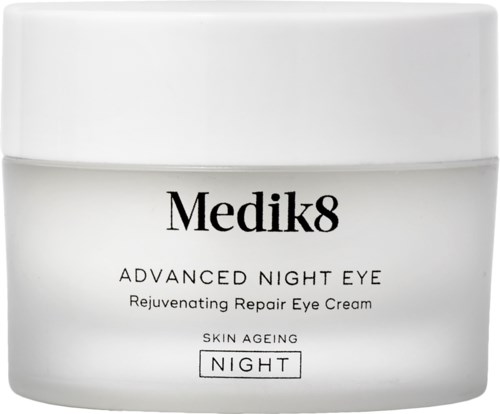 Ein weißer Behälter mit Medik8 Advanced Night Eye, einer regenerierenden Augencreme gegen Hautalterung. Nachtversion.