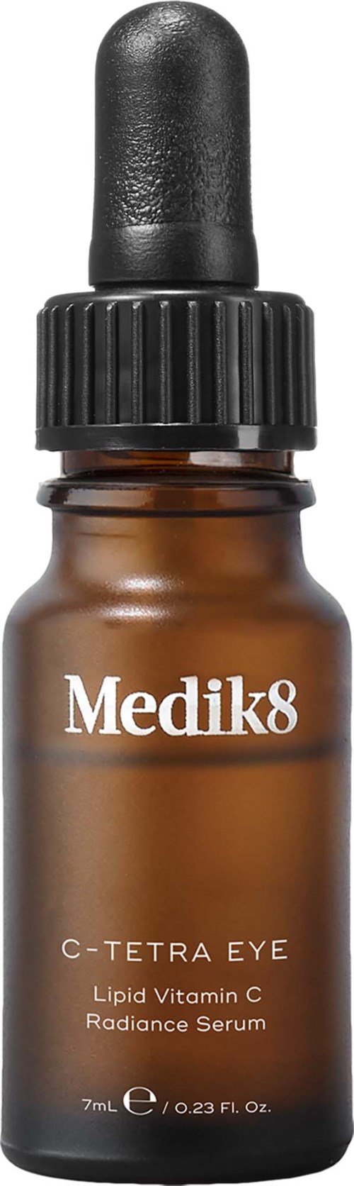 Kleine braune Flasche mit schwarzem Tropf-kopf, markiert Medik8 C-Tetra Eye Lipid Vitamin C Serum.