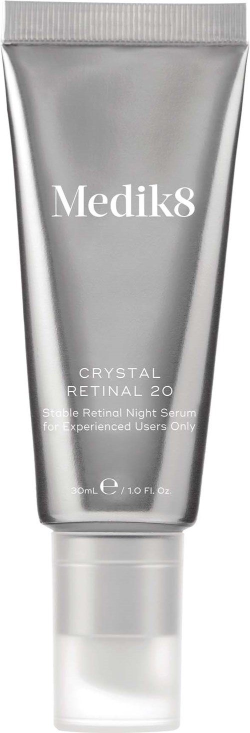 A silver tube of Medik8 skincare cream with white text, labeled for nighttime use, contains 30ml.