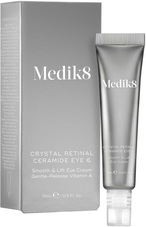 Hopeasiilto, harmaa boxi ja hopeainen putki Medik8 Crystal Retinal Ceramide Eye 6 -silmävoidetta varten. Boxissa on valkoinen teksti.