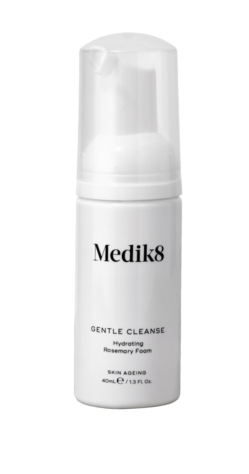 A white bottle of Medik8 Gentle Cleanse Hydrating Rosemary Foam skincare product.