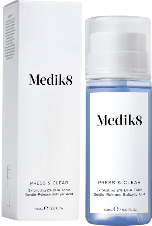 A white box and a clear bottle labeled 'Medik8' with blue liquid inside. The bottle has a white cap. Both are skincare products.