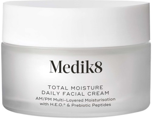 A white jar of Medik8 Total Moisture Daily Facial Cream with multi-layer hydration and probiotics.
