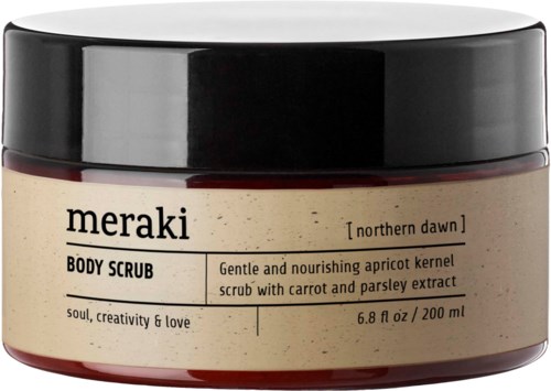 Ein Behälter mit Körperpeeling 'meraki' mit Aprikosenkern, Karotten- und Petersiliensaft. Schwarzer Deckel und beiger Behälter.