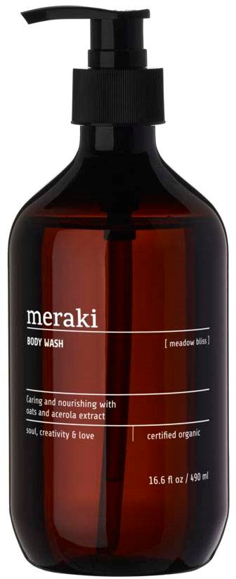 En brun flaska med svart pump och vit text, märkt meraki body wash med ekologiska ingredienser.