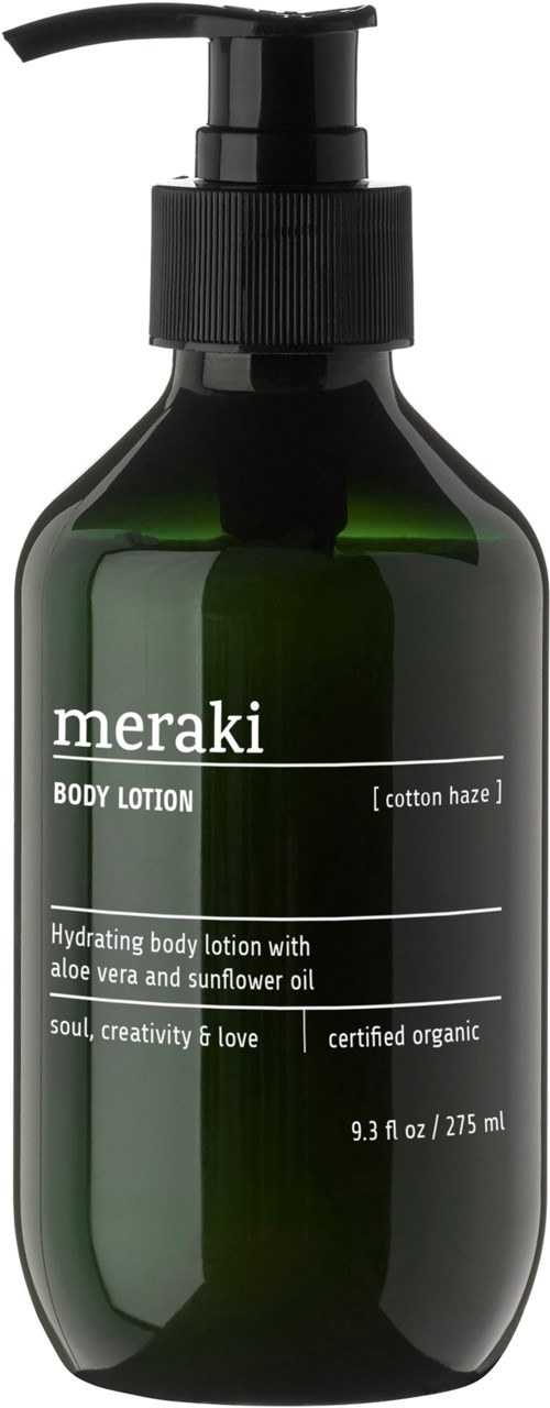 Eine grüne Flasche Meraki Körperlotion mit Pumpe, beschriftet mit Inhaltsstoffen und Marke.