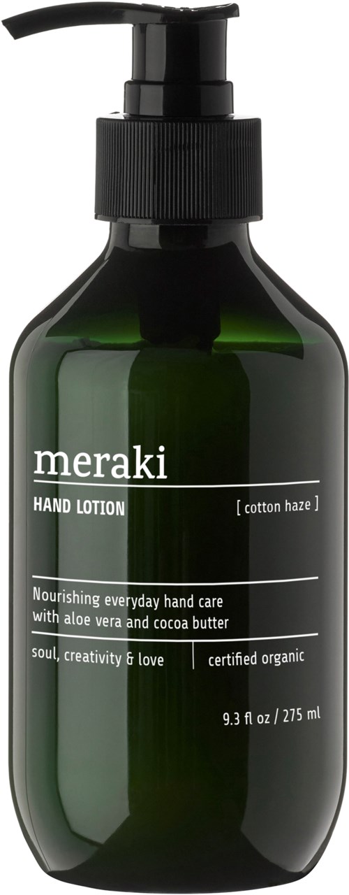 A green bottle with a pump labeled "meraki hand lotion" containing aloe vera and cocoa butter.