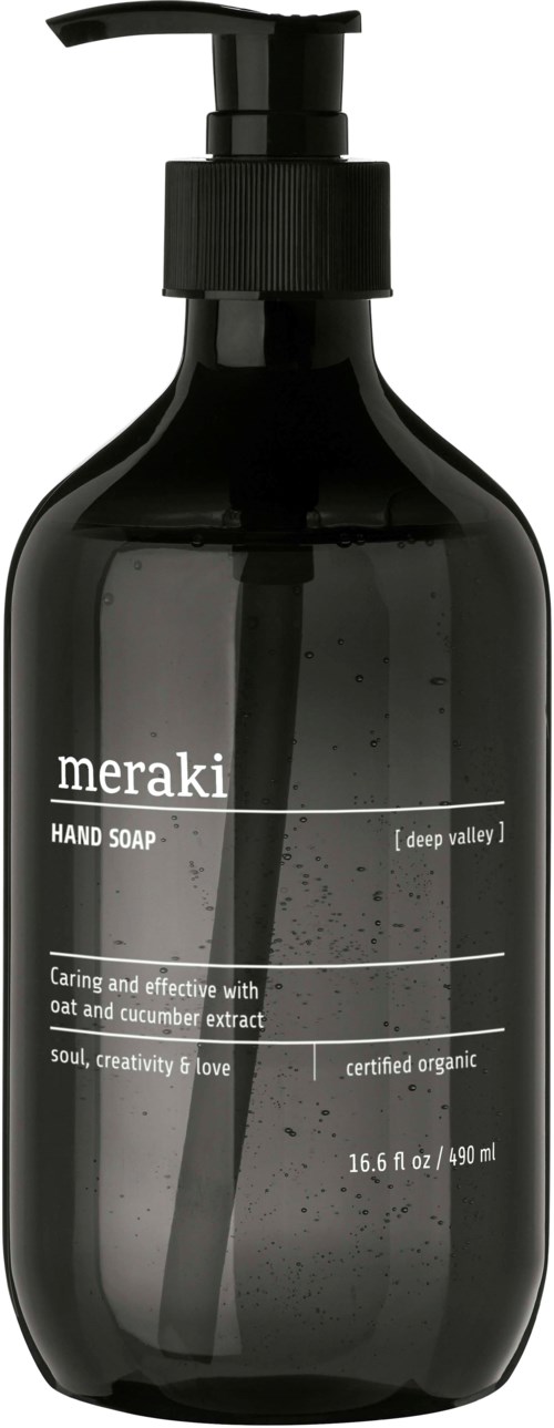 Black soap bottle with pump, labeled 'meraki hand soap' and details about ingredients and certification.