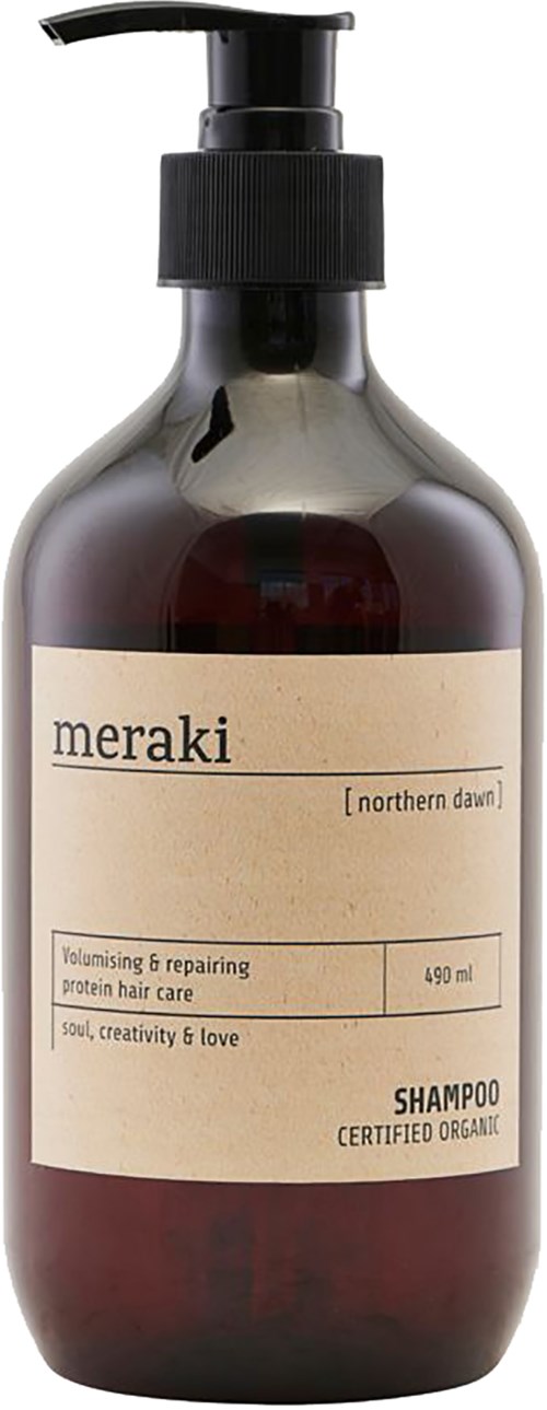 En mørk flaske med pumpe, merket 'meraki' for hårpleie, økologisk sjampo, 490 ml.