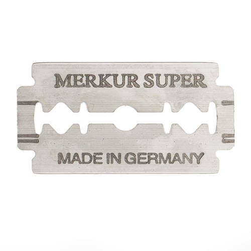 A razor blade with the words "Merkur Super" and "Made in Germany" on it.
