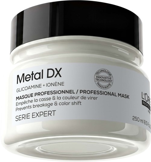 L'Oréal Metal DX professionell maskburk med svart lock, vit etikett och produktinformation inklusive ingredienser och fördelar.