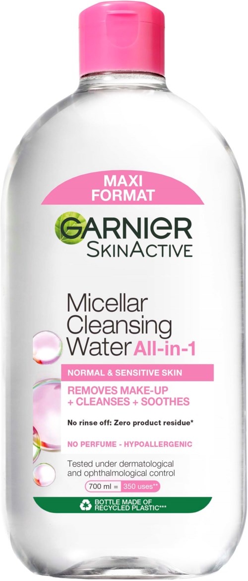 A clear bottle with pink cap, labeled as Garnier Micellar Cleansing Water for normal and sensitive skin.