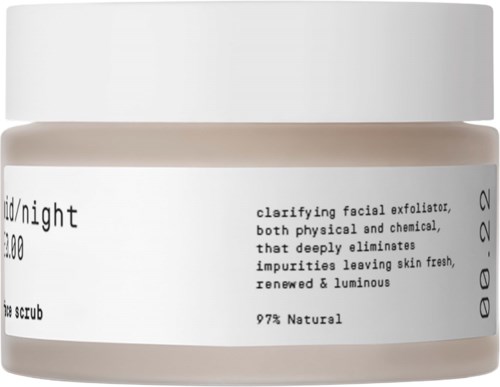 A jar of facial exfoliator with simple, natural ingredients for clear, glowing skin.