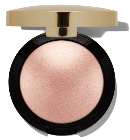 A round makeup compact with a gold lid, containing shimmery pink powder.