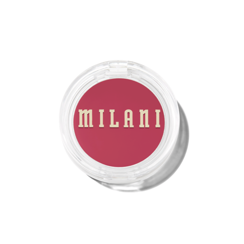A circular object with a pink center and the word "MILANI" in bold, cream-colored letters.
