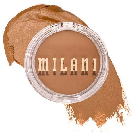 A makeup product with a clear top showing tan-colored cream inside and the word 'Milani' on it.