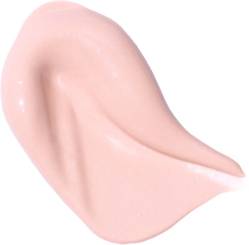 Cream spread with a smooth, shiny, beige surface and a slight curl shape.
