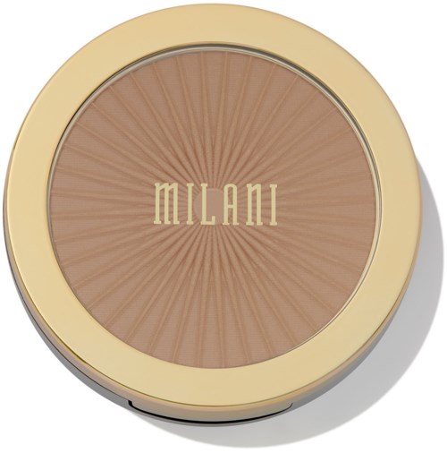 A round compact makeup with a beige outer rim and a starburst pattern on the powder inside with the word 'Milani' in the center.