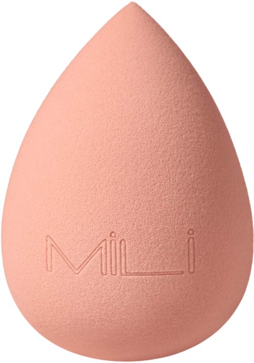 En ferskenfarget sminksvamp med merket "Mii" inngravert på den.