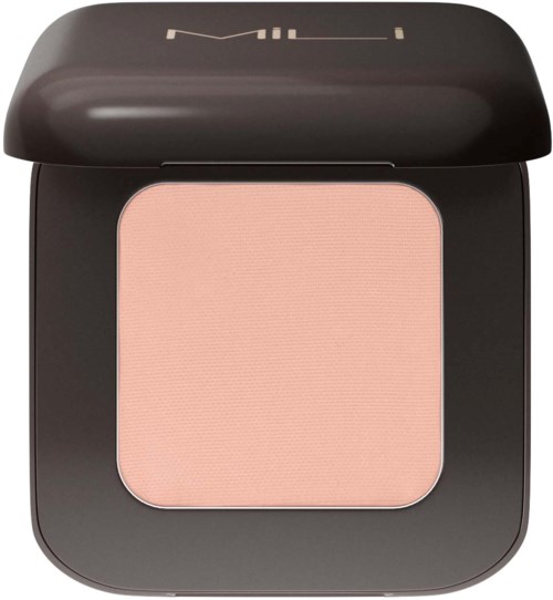 A makeup compact with light pink powder inside, in a black case with a shiny lid.