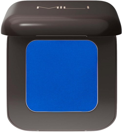 Blue eyeshadow in a black round compact with a mirror. The compact lid is open.
