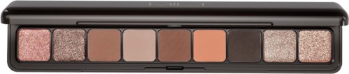 A makeup palette with eight eyeshadow colors in shades of pink, brown, and glitter. The palette is black and rectangular.