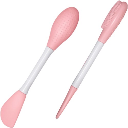 Two pink tools, one with a rounded soft head and one with a textured brush tip.