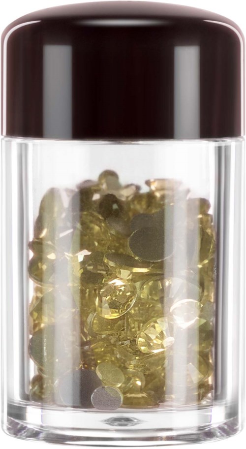 Small bottle filled with yellowish capsules or pills, with a dark cap. Clear container showing the contents inside.