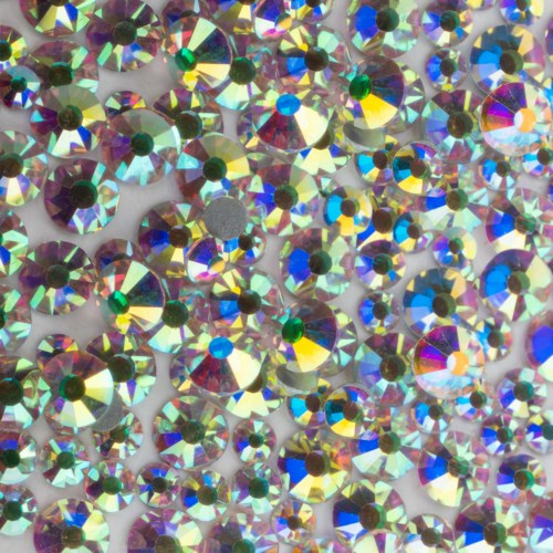 Small, shiny, colorful rhinestones sparkle and cover the surface in a glittering array.