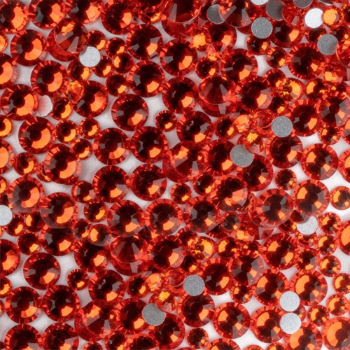 Numerous red rhinestones cover the surface, shiny and reflective, creating a sparkling, decorative effect.
