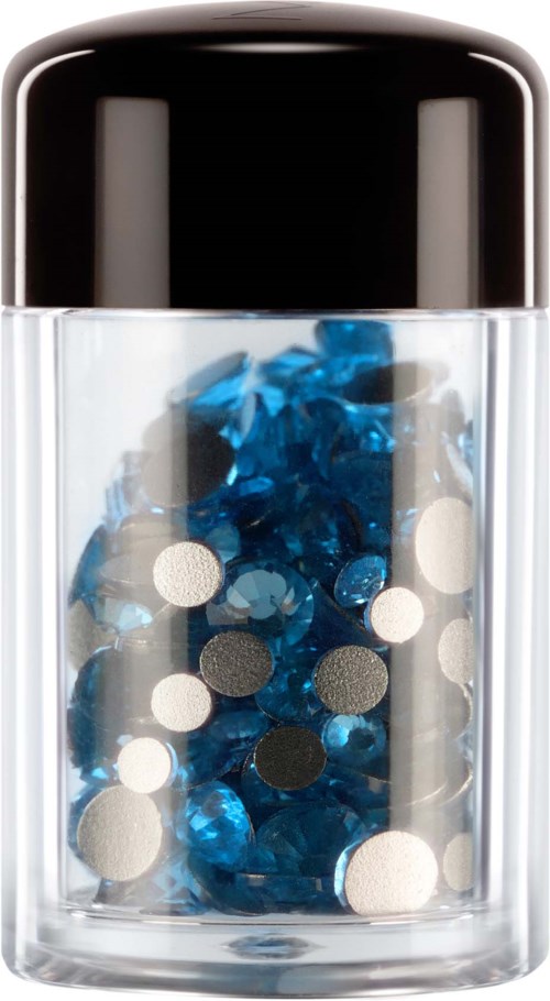 A clear container holds blue and silver glitter with a black cap on top.