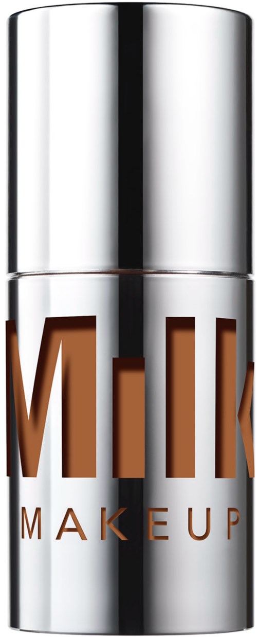 A silver bottle with brown and white letters spelling "MIK MAKEUP".