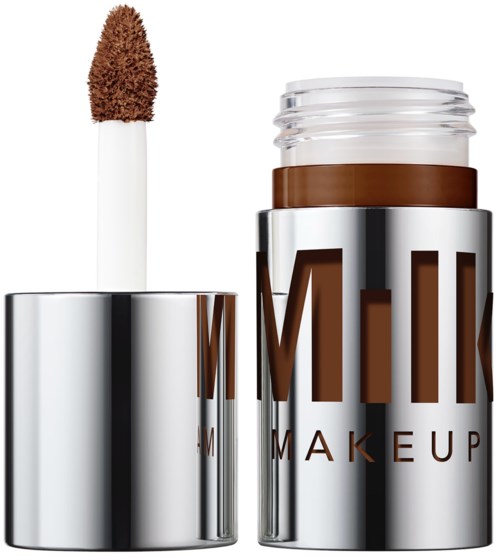 A lip gloss container with a brush applicator, labeled 'M.A.C' and the word 'MAKEUP'.
